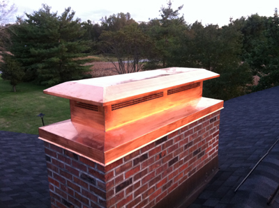Before and after chimney cap replacement in Merrick, NY